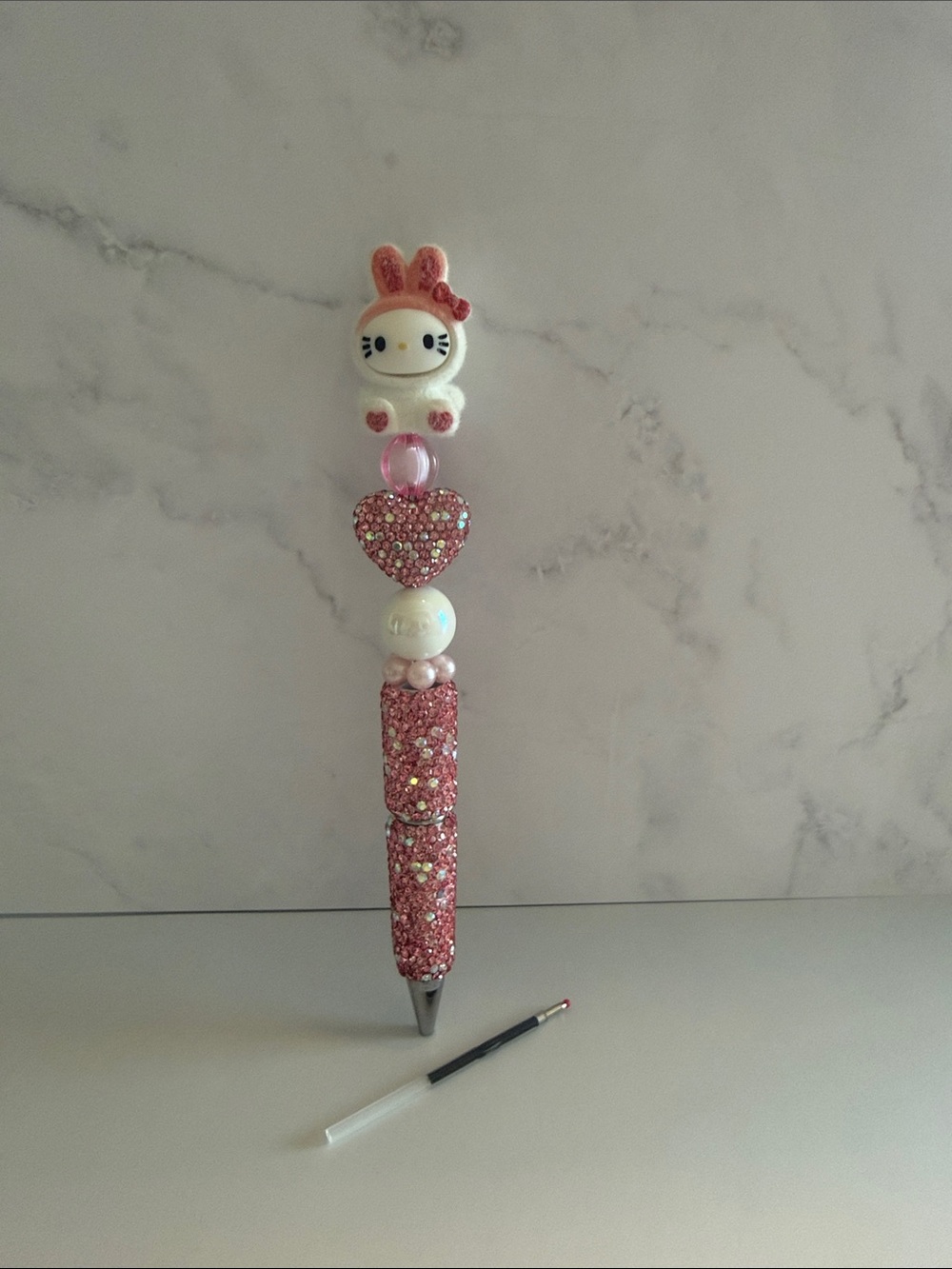 💗✨ Cute Hello Kitty figure with rhinestone heart and barrel. Ink refill